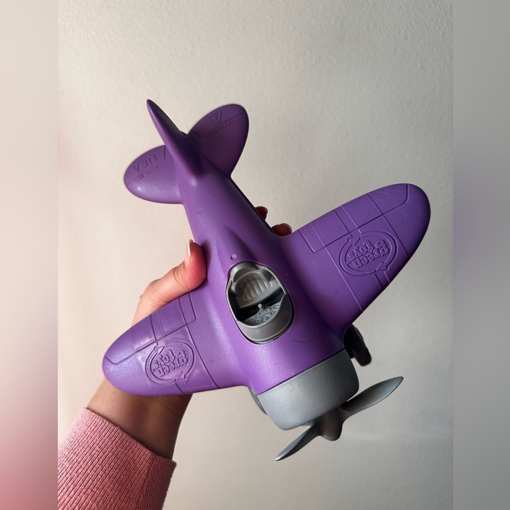 Green toys purple airplane
